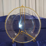 Location - Grand plat rond porte assiette transparent bords dorés