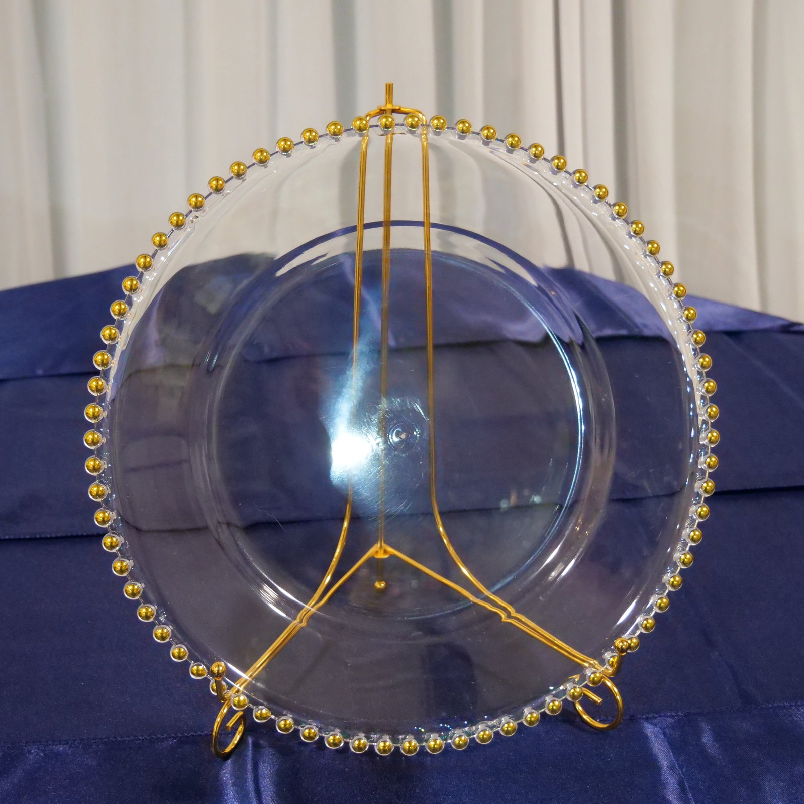 Location - Grand plat rond porte assiette transparent bords dorés